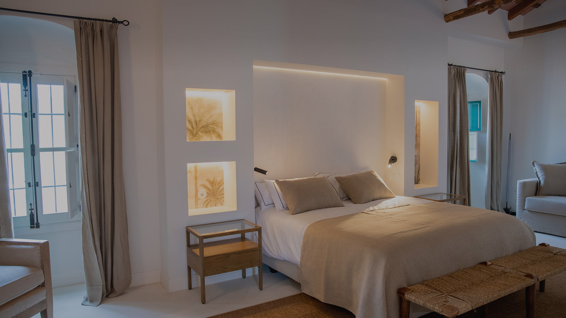 Interior of one of the fully equipped rooms with double bed.