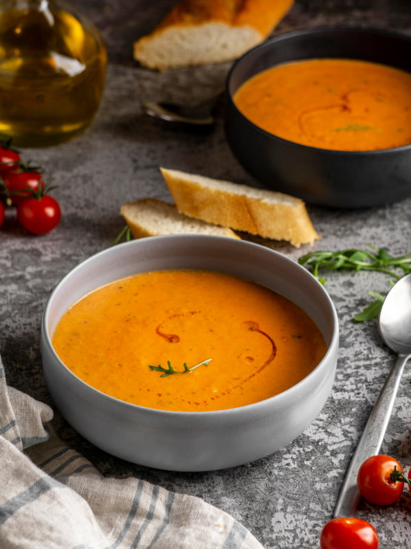 Plate of salmorejo, served inside a ceramic bowl