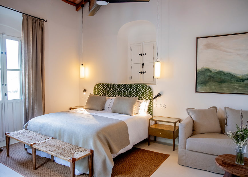 Side view of the King Size Bed with upholstered headboard with green printed fabric